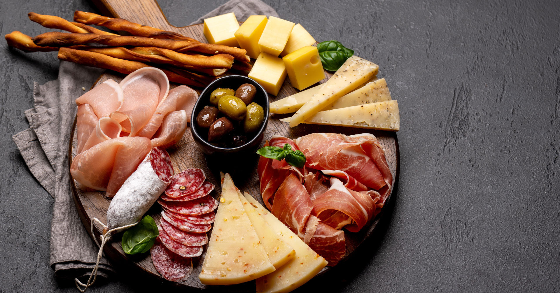 Platter of cured meats, cheeses, and charcuterie